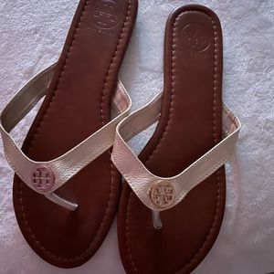 EUC Tory Burch leather flip flops in Gold. No box. Size 10.